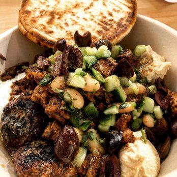 CAVA - Spicy lamb meatballs and chicken on brown rice bowl - Mediterranean Near Me - Pasadena, California CAVA - Spicy lamb meatballs and chicken on brown rice bowl - Mediterranean Near Me - Pasadena, California