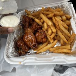 Macs Pizza & Wings - Bourbon st wings and fries which