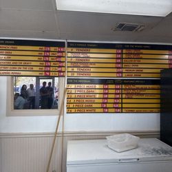 Gill's Gold-N-Crisp Fried Chicken - Menu on wall