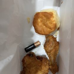 KFC - Put a AA battery next to chicken(pigeon) for size reference. Talk about shrinkflation. Smallest chicken leg ever gotten