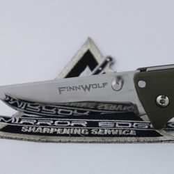 M1rror Edge Sharpening Service - Scandi Grind Knife with a polished edge and grind.