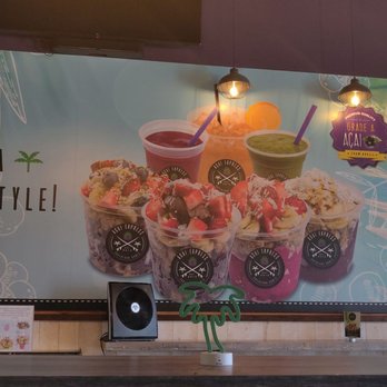Acai Express - a table with a vase of flowers on it - Acai Bowls Near Me - Rockaway, New Jersey Acai Express - a table with a vase of flowers on it - Acai Bowls Near Me - Rockaway, New Jersey
