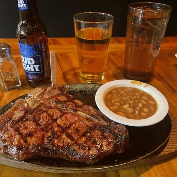 Silver Saddle Steakhouse - T-bone steak with the Bud Light. - Steakhouses Near Me - Tucson, Arizona Silver Saddle Steakhouse - T-bone steak with the Bud Light. - Steakhouses Near Me - Tucson, Arizona
