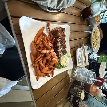 Peppers Bar & Grill - Ribs with sweet potato fries - Caribbean Near Me - Grand Cayman, Florida Peppers Bar & Grill - Ribs with sweet potato fries - Caribbean Near Me - Grand Cayman, Florida