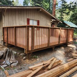 Jeff Denison - Cedar Deck and railing Finished.