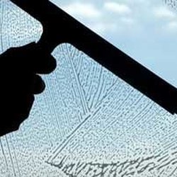 Ron's Window Cleaning - Squeegee window cleaning Source: Creative Commons