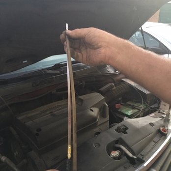 Premier Motorcars - Measuring the proper distance for the suction tubing. - Car Dealers Near Me - Henderson, Nevada Premier Motorcars - Measuring the proper distance for the suction tubing. - Car Dealers Near Me - Henderson, Nevada