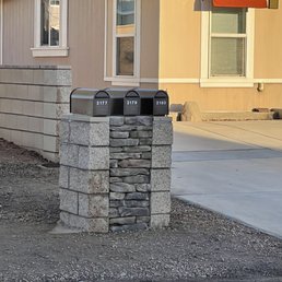 Custom mail box pillar using the same block plus stones we provided.