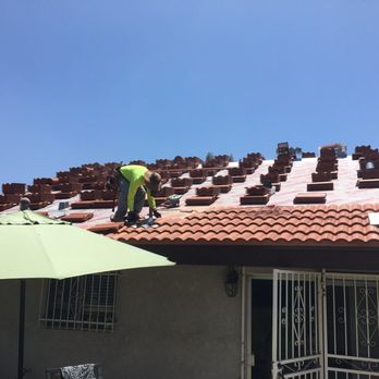 Luckett Roofing - One of the Luckett Roofing installers doing precision work here. - Roofing Near Me - Rancho Cucamonga, California