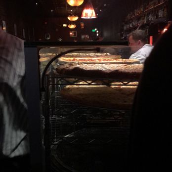Rocco's - This is what it would look like when you walk in. I didn't take one of the actual slice because I inhaled it! - Bars Near Me - Seattle, Washington Rocco's - This is what it would look like when you walk in. I didn't take one of the actual slice because I inhaled it! - Bars Near Me - Seattle, Washington