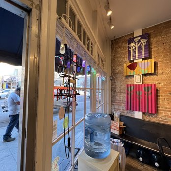 Cream Bean Berry - a man walking past a store window - Ice Cream & Frozen Yogurt Near Me - Durango, Colorado