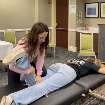 Path Medical - OBT - Dr. Vleko performing a knee adjustment. - Chiropractors Near Me - Orlando, Florida Path Medical - OBT - Dr. Vleko performing a knee adjustment. - Chiropractors Near Me - Orlando, Florida