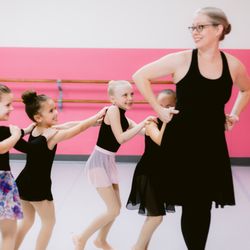 St Augustine Dance Academy - Ballet teacher with young dancers
