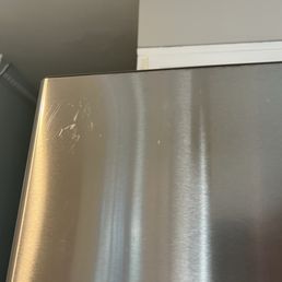 Scratching left on a new refrigerator! Scratching left on a new refrigerator!
