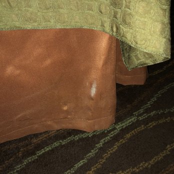 Super 8 by Wyndham Canton - Another weird stain on bed skirt. - Hotels Near Me - Canton, Mississippi