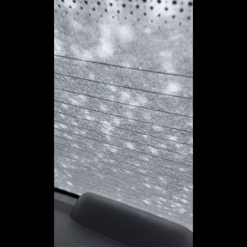 Car-On Auto Sales - Inside of rear window 8 minutes after turning on the rear defroster. - Car Dealers Near Me - Ottawa, Ontario