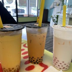 Poke Bowl Sushi Burritos and Boba - Thai tea, vanilla, and mango with boba.