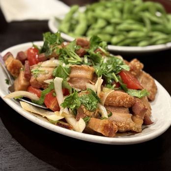 Side Street Inn - Crispy Pork Poke! This is the best roast pork I've ever had. The red vinaigrette dressing accentuated the richness of the pork! Addictive! - Hawaiian Near Me - Honolulu, Hawaii
