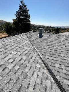 Slide of Zaguilan Roofing Service