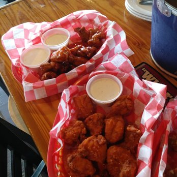 Cluckers - Boneless wings. Hot and sassy garlic and sweet thai chili. - Bars Near Me - Jeffersonville, Indiana Cluckers - Boneless wings. Hot and sassy garlic and sweet thai chili. - Bars Near Me - Jeffersonville, Indiana