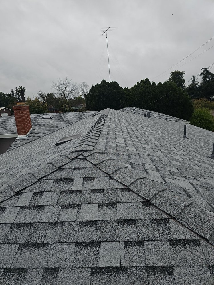 Slide of Econo Roofing