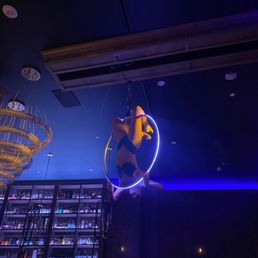 a man suspended from the ceiling a man suspended from the ceiling