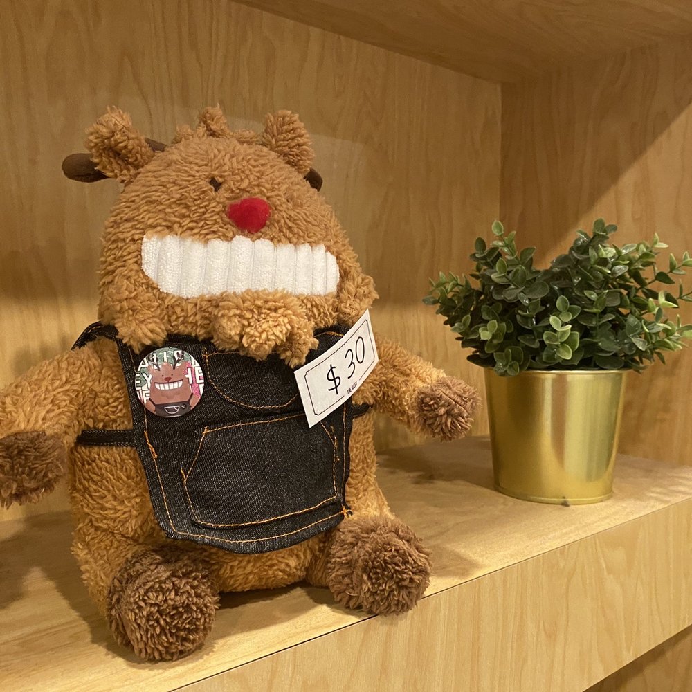The Alley - a teddy bear in overalls and a potted plant - Bubble Tea Near Me - Edmonton, Alberta The Alley - a teddy bear in overalls and a potted plant - Bubble Tea Near Me - Edmonton, Alberta