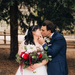 Fantasy Floral Designs - Bride bouquet and groom's boutonnière.
