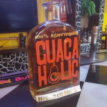 Guacaholic Mexican Grill And Bar - Tequila bottle - Mexican Near Me - Spring Lake, North Carolina Guacaholic Mexican Grill And Bar - Tequila bottle - Mexican Near Me - Spring Lake, North Carolina