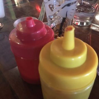 Julians - Love this- red is regular ketchup and yellow is house made ketchup- love that they offer this. Nice added touch - New American Near Me - Providence, Rhode Island