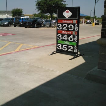 Kroger - a gas station with a sign showing prices - Grocery Near Me - Richmond, Texas Kroger - a gas station with a sign showing prices - Grocery Near Me - Richmond, Texas