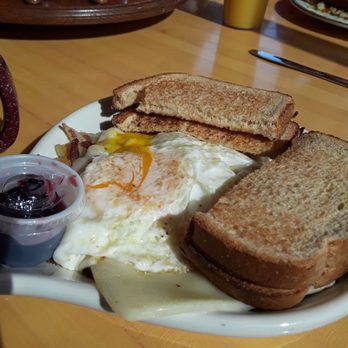 The Lunchbox - Corned beef skillet with wheat toast and homemade jam.  Delicious. - American Near Me - Curran, Michigan