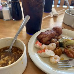 Hot sour soup.. extra heat! Chicken skewers seafood scampi