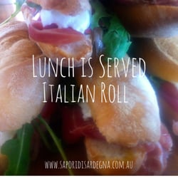 Sapori Di Sardegna - Lunch is served. Crusty Italian rolls with prosciutto, bocconcini and rocket.