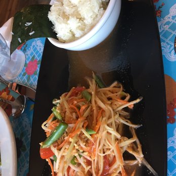 Kai Mook - Papaya salad with the recommended sticky rice - Thai Near Me - Millbury, Massachusetts Kai Mook - Papaya salad with the recommended sticky rice - Thai Near Me - Millbury, Massachusetts