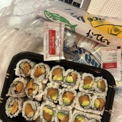 Royal Sushi & Bar - Two salmon avocado rolls and one spicy salmon roll