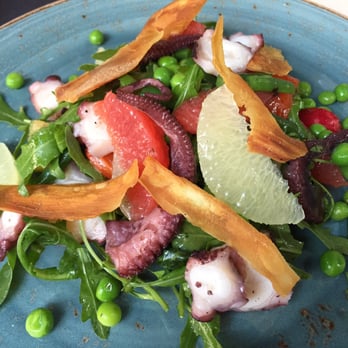 Brasserie Appelmans - Fresh salad with citrus, octopus and chips maniok. - Belgian Near Me - Antwerp, VAN Brasserie Appelmans - Fresh salad with citrus, octopus and chips maniok. - Belgian Near Me - Antwerp, VAN