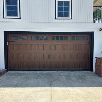Alliant Garage Door - Amarr Hillcrest in walnut color. Frosted thames windows. - Garage Door Services Near Me - Anaheim, California Alliant Garage Door - Amarr Hillcrest in walnut color. Frosted thames windows. - Garage Door Services Near Me - Anaheim, California