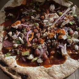 a pizza in a pizza box