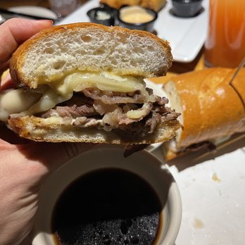 Bobby Q - Mesa - Prime rib sandwich ready for a dip - New American Near Me - Mesa, Arizona Bobby Q - Mesa - Prime rib sandwich ready for a dip - New American Near Me - Mesa, Arizona