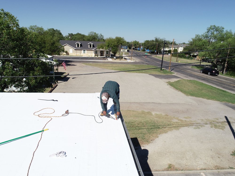Slide of Kent Elliott Roofing