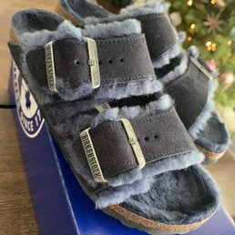 dark brown leather flip flops