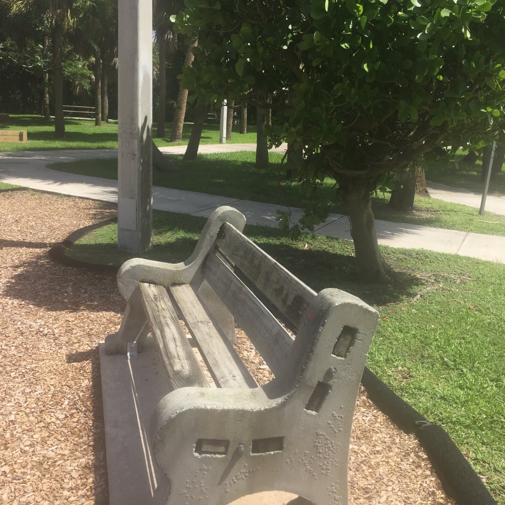 Burt Reynolds Park - a bench sitting around the playground (1 of 3) - Parks Near Me - Jupiter, Florida
