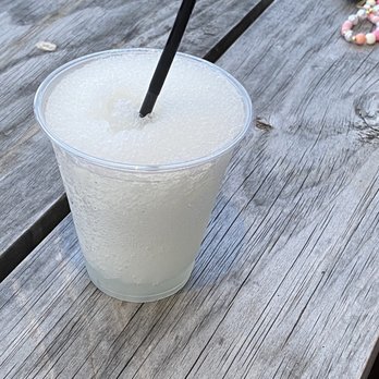 The Garden - a drink in a plastic cup on a picnic table - Cafes Near Me - Philadelphia, Pennsylvania The Garden - a drink in a plastic cup on a picnic table - Cafes Near Me - Philadelphia, Pennsylvania
