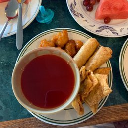 a bowl of tea and a plate of food a bowl of tea and a plate of food