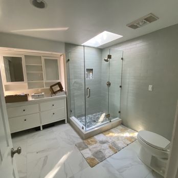 RTA Construction - a bathroom with a skylight - General Contractors Near Me RTA Construction - a bathroom with a skylight - General Contractors Near Me