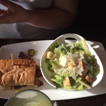 Yard House - Pastrami sandwich and side Caesar salad - New American Near Me - Oxnard, California Yard House - Pastrami sandwich and side Caesar salad - New American Near Me - Oxnard, California