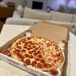 Society Pie - Half Pepperoni Pizza & Half Hawaiian Pizza.