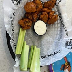 Chuck E. Cheese - $18 for this?! They tasted just like Tyson frozen which is probably what they are.