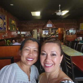 Thai & Lao Bistro - The owner to my left..sweet lady - Thai Near Me - Jacksonville, Florida Thai & Lao Bistro - The owner to my left..sweet lady - Thai Near Me - Jacksonville, Florida